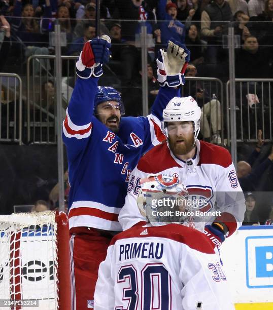 Chris Kreider of the New York Rangers celebrates a 12p goal by Mika Zibanejad against Cayden Primeau of the Montreal Canadiens at Madison Square...