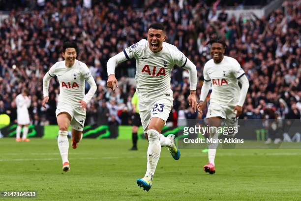 Pedro Porro of Tottenham Hotspur celebrates his goal with Son Heung-min and Destiny Udogie during the Premier League match between Tottenham Hotspur...