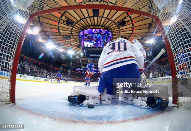 Chris Kreider of the New York Rangers celebrates a third period goal by Mika Zibanejad against the Montreal Canadiens at Madison Square Garden on...