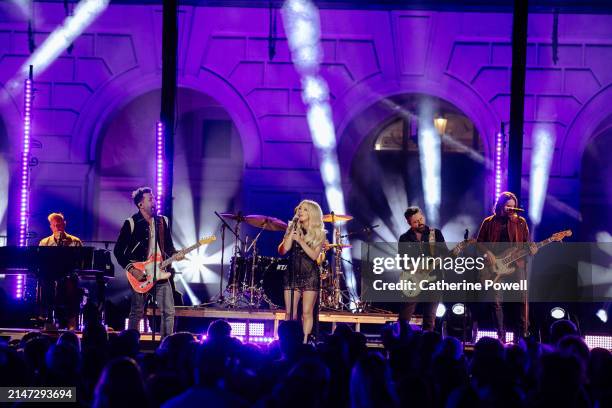 Matthew Ramsey, Geoff Sprung, Brad Tursi and Trevor Rosen of Old Dominion and Megan Moroney perform onstage during the 2024 CMT Music Awards at Moody...