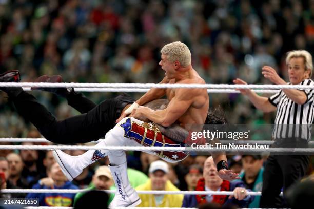 Roman Reigns and Cody Rhodes fight for the Undisputed WWE Universal Championship during Night Two at Lincoln Financial Field on April 07, 2024 in...