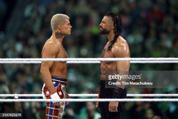 Roman Reigns and Cody Rhodes look on during Night Two at Lincoln Financial Field on April 07, 2024 in Philadelphia, Pennsylvania.