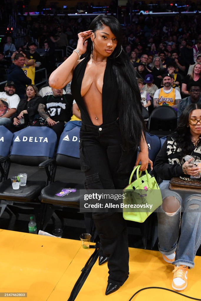 Megan Thee Stallion attends a basketball game between the Los Angeles