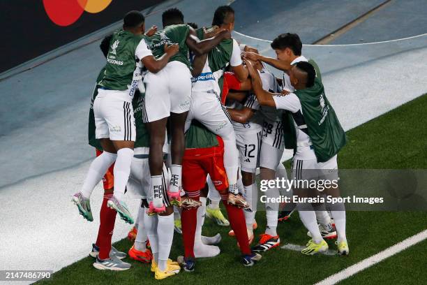 Junior players celebrate a goal during the Copa CONMEBOL Libertadores match between Botafogo and Junior at Estadio Olimpico Nilton Santos on April 3,...