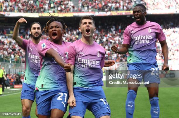 Christian Pulisic of AC Milan celebrates scoring his team's first goal with teammate Samuel Chukwueze during the Serie A TIM match between AC Milan...