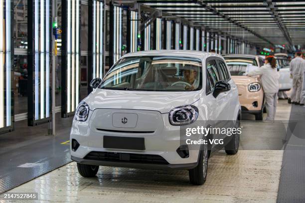 New energy vehicles roll off the production line at an intelligent factory of electric vehicle enterprise Leapmotor on April 8, 2024 in Jinhua,...
