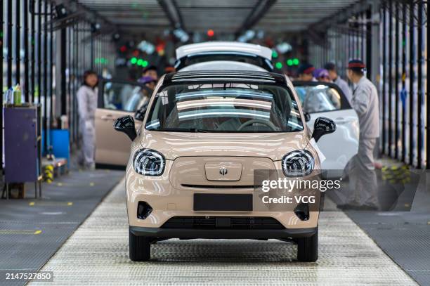 New energy vehicles roll off the production line at an intelligent factory of electric vehicle enterprise Leapmotor on April 8, 2024 in Jinhua,...