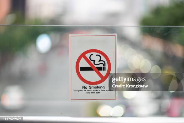 no smoking sticker on glass in public - no smoking sign stock pictures, royalty-free photos & images