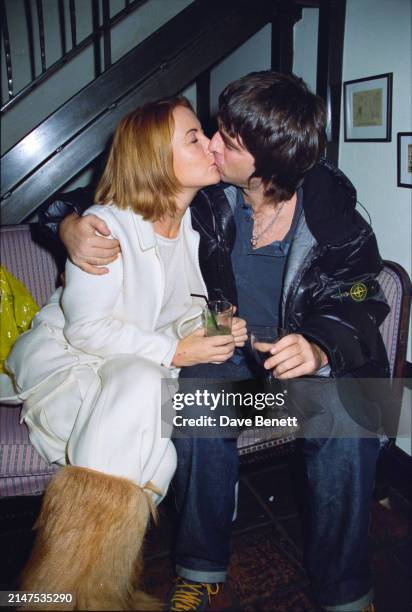 English musician Noel Gallagher and partner Meg Mathews attend a book launch event at Smith's for the photographer Albert Watson, London, December...