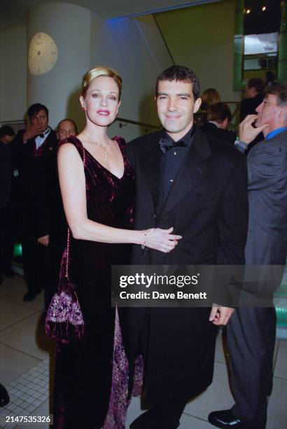 American actor Melanie Griffith and Spanish actor Antonio Banderas attend the UK film premiere of Martin Campbell's 'The Mask of Zorro' at the Odeon...