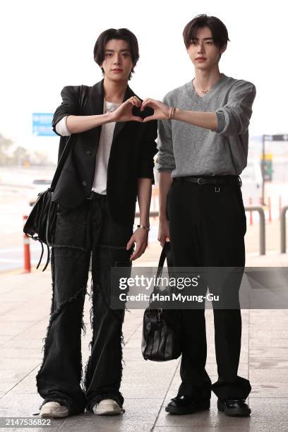 Jake and Sunghoon of boy band ENHYPEN are seen on departure at Gimpo International airport on April 08, 2024 in Seoul, South Korea.