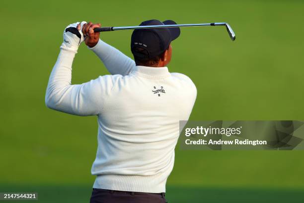 Tiger Woods of the United States warms up in the practice area prior to the 2024 Masters Tournament at Augusta National Golf Club on April 08, 2024...