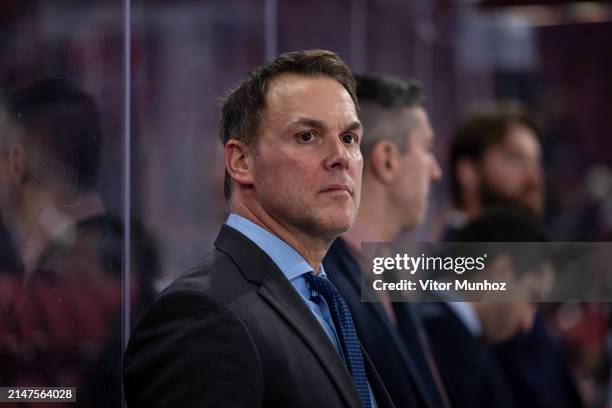 Montreal Canadiens Goalie Coach Eric Raymond looks on during the warm-up period of the NHL regular season game between the Montreal Canadiens and the...