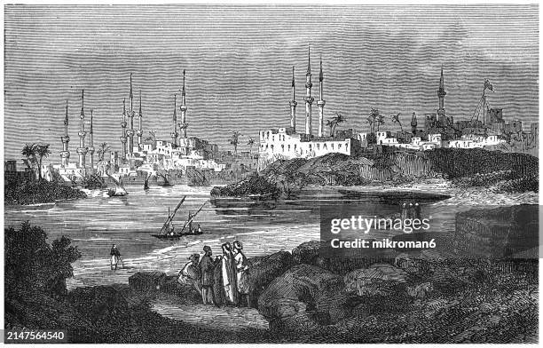 old engraved illustration of damietta, a port city and the capital of the damietta governorate in egypt (located at the damietta branch, an eastern distributary of the nile delta) - nile delta stock pictures, royalty-free photos & images