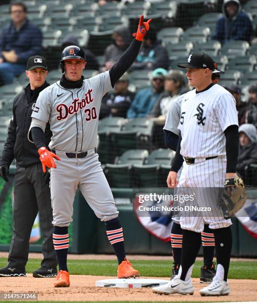 Kerry Carpenter of the Detroit Tigers reacts after a single against the Chicago White Sox at Guaranteed Rate Field on March 31, 2024 in Chicago,...