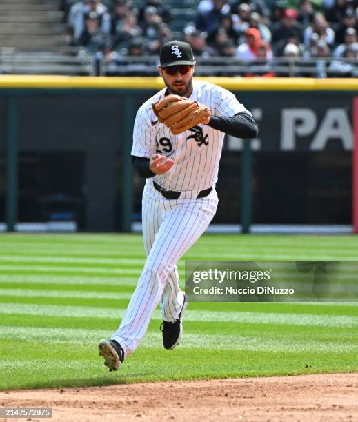 Paul DeJong of the Chicago White Sox catches the fly out by Colt Keith of the Detroit Tigers at Guaranteed Rate Field on March 31, 2024 in Chicago,...