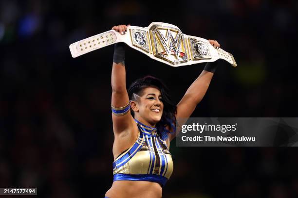 Bayley reacts after defeating IYO SKY for the WWE Women's Championship during Night Two at Lincoln Financial Field on April 07, 2024 in Philadelphia,...