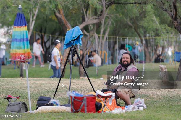 Man has his gear set up ahead of the eclipse at Bosque Urbano on April 8, 2024 in Torreon, Mexico. Millions of people have flocked to areas across...