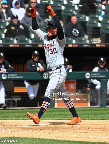 Kerry Carpenter of the Detroit Tigers jogs after hitting a home run against the Chicago White Sox at Guaranteed Rate Field on March 31, 2024 in...