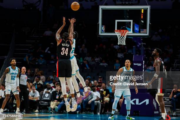 Jabari Walker of the Portland Trail Blazers shoots the ball during the first half of a basketball game against the Charlotte Hornets at Spectrum...