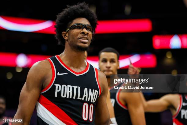 Scoot Henderson of the Portland Trail Blazers reacts during the first half of a basketball game against the Charlotte Hornets at Spectrum Center on...