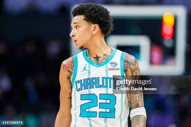 Tre Mann of the Charlotte Hornets looks on during the first half of a basketball game against the Portland Trail Blazers at Spectrum Center on April...