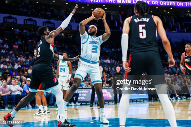 Marques Bolden of the Charlotte Hornets shoots the ball during the first half of a basketball game against the Portland Trail Blazers at Spectrum...