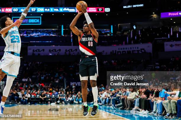 Scoot Henderson of the Portland Trail Blazers shoots the ball during the second half of a basketball game against the Charlotte Hornets at Spectrum...