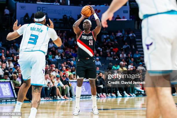 Duop Reath of the Portland Trail Blazers shoots the ball during the second half of a basketball game against the Charlotte Hornets at Spectrum Center...