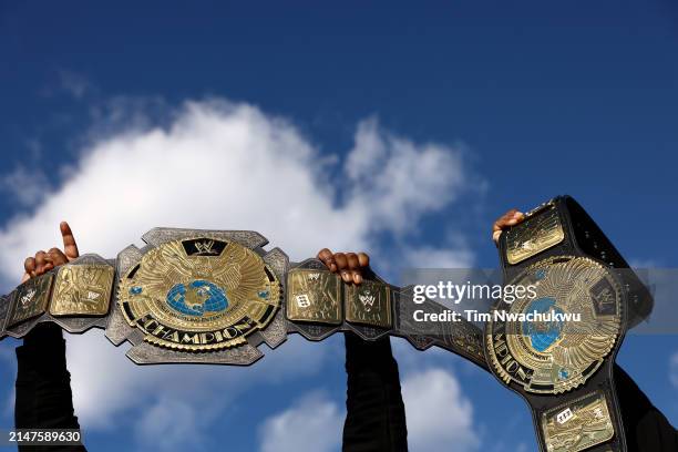 Fans displays their replica WWE Championship belts during Night Two outfield WrestleMania 40 at Lincoln Financial Field on April 07, 2024 in...