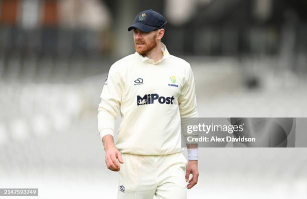 James Harris of Glamorgan looks on during Day 4 of the Vitality County Championship match between Middlesex and Glamorgan at Lord's Cricket Ground on...