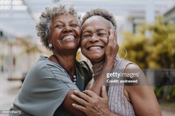 portrait of two senior friends - women active lifestyle stock pictures, royalty-free photos & images