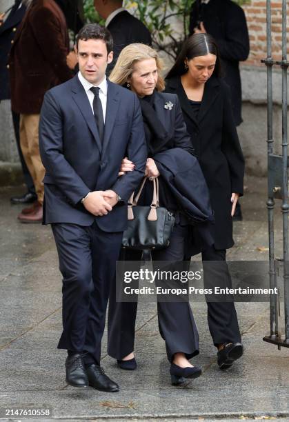 The Infanta Elena de Borbon and her two children, Felipe Juan Froilan and Victoria Federica, leave the Castrense Cathedral where they attended the...
