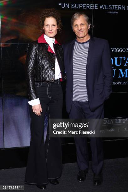 Vicky Krieps and Viggo Mortensen attend the "Jusqu'au Bout Du Monde" premiere at Cinema UGC Cine Cite des Halles on April 08, 2024 in Paris, France.