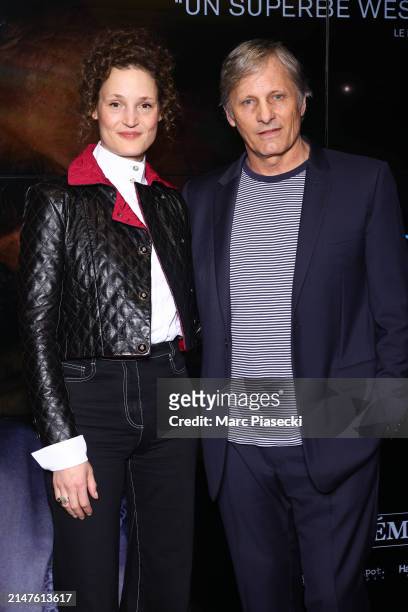 Vicky Krieps and Viggo Mortensen attend the "Jusqu'au Bout Du Monde" premiere at Cinema UGC Cine Cite des Halles on April 08, 2024 in Paris, France.