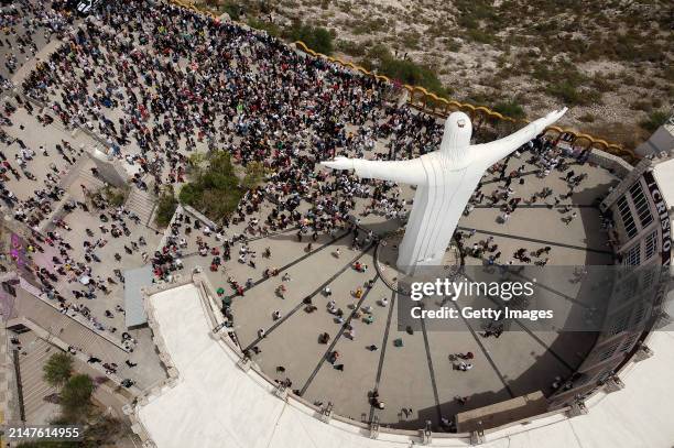 Aerial view of people watching the eclipse at Cristo de las Noas on April 08, 2024 in Torreon, Mexico. Millions of people have flocked to areas...