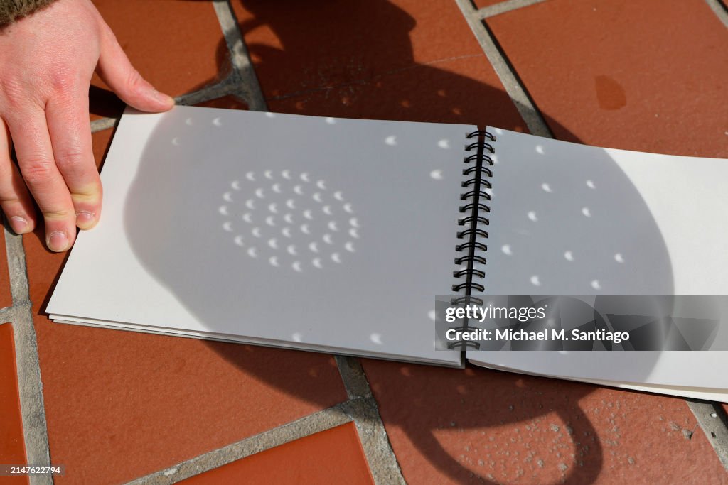New Yorkers Get A View Of Partial Solar Eclipse