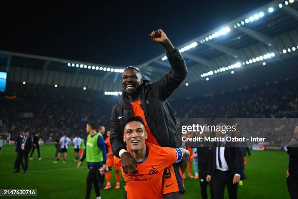 Lautaro Martinez and Marcus Thuram of FC Internazionale celebrates the win at the end of the Serie A TIM match between Udinese Calcio and FC...