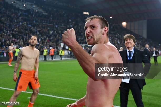 Davide Frattesi of FC Internazionale shows appreciation to the fans whilst celebrating victory in the Serie A TIM match between Udinese Calcio and FC...