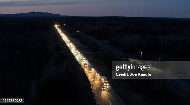 In an aerial view, I-95 southbound traffic is heavy as people make their way home after witnessing the eclipse on April 08, 2024 in Houlton, Maine....