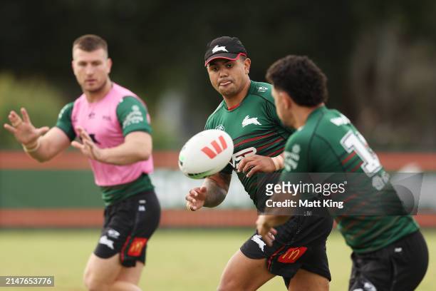 Latrell Mitchell of the Rabbitohs takes a pass during a South Sydney Rabbitohs NRL training session at USANA Rabbitohs Centre on April 09, 2024 in...