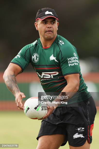 Latrell Mitchell of the Rabbitohs passes during a South Sydney Rabbitohs NRL training session at USANA Rabbitohs Centre on April 09, 2024 in Sydney,...