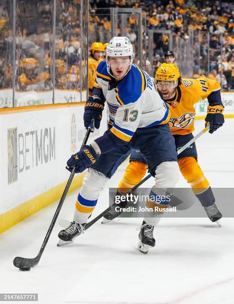 Alexey Toropchenko of the St. Louis Blues skates against the Nashville Predators during an NHL game at Bridgestone Arena on April 4, 2024 in...