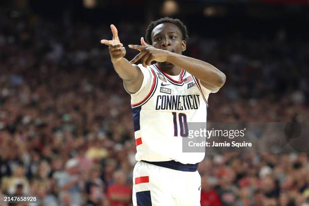 Hassan Diarra of the Connecticut Huskies reacts in the first half against the Purdue Boilermakers during the NCAA Men's Basketball Tournament...