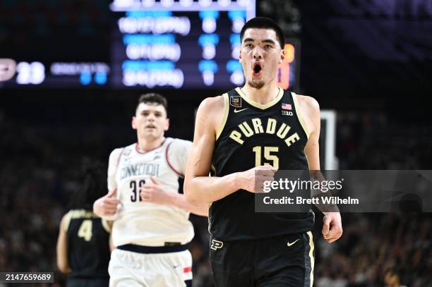 Zach Edey of the Purdue Boilermakers celebrates during the first half in the NCAA Men's Basketball Tournament National Championship game at State...