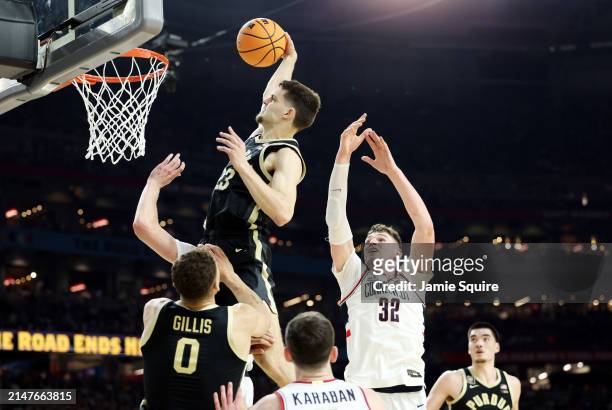Camden Heide of the Purdue Boilermakers dunks the ball in the second half against the Connecticut Huskies during the NCAA Men's Basketball Tournament...