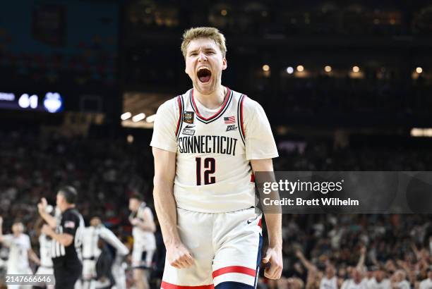 Cam Spencer of the Connecticut Huskies reacts during the second half in the NCAA Men's Basketball Tournament National Championship game at State Farm...