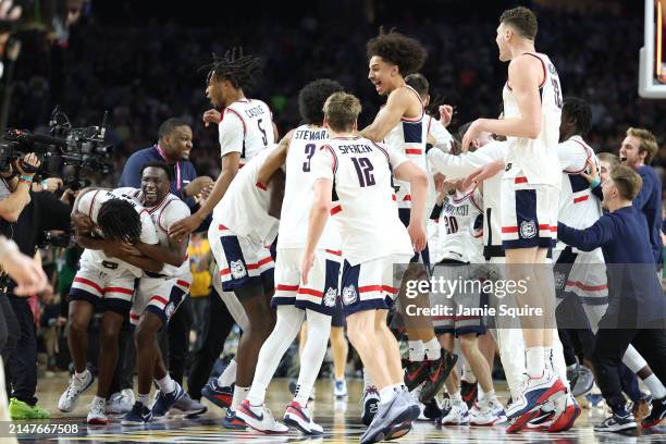 The Connecticut Huskies celebrate after beating the Purdue Boilermakers 75-60 to win the NCAA Men's Basketball Tournament National Championship game...