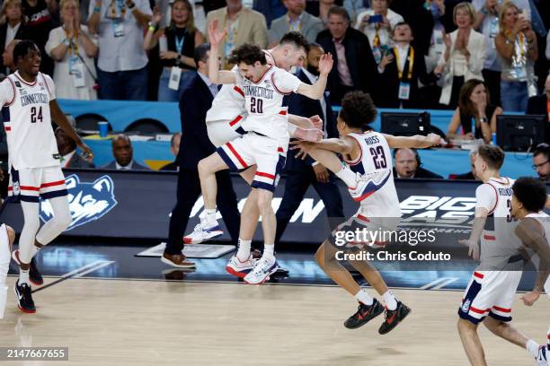 The Connecticut Huskies celebrate after beating the Purdue Boilermakers 75-60 to win the NCAA Men's Basketball Tournament National Championship game...