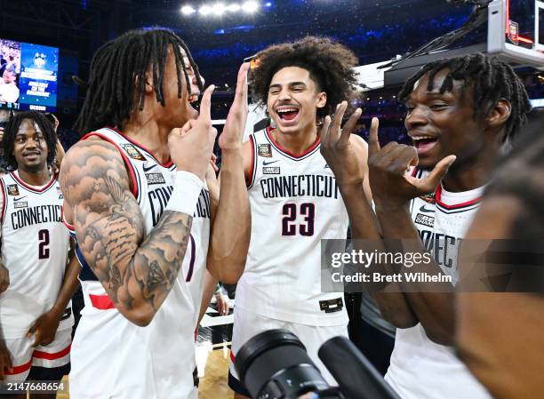 Connecticut Huskies celebrate after defeating the Purdue Boilermakers in the NCAA Men's Basketball Tournament National Championship game at State...